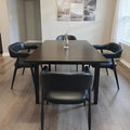 Wahson Black Leather Dining Chairs Set of 4 with Black Metal Legs, Mid Century Modern Kitchen Chairs with Curved Backrest, Accent Low Back Armset Chairs for Dining Room/Kitchen/Bar