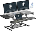 FLEXISPOT Standing Desk Converter 42-inch Spacious Sit to Stand up Dual Monitor and Laptop Riser, Big Size Tabletop Workstation with Large Keyboard Tray, Black