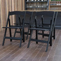 EMMA + OLIVER Folding Chair - Black Resin – 4 Pack 800LB Weight Capacity Comfortable Event Chair - Light Weight Folding Chair