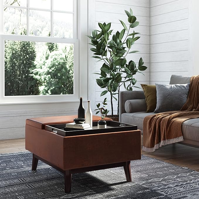 SIMPLIHOME Owen Tray Top Small Coffee Table Storage Ottoman - 34 inch Wide Upholstered Vegan Leather Rectangular Flip-Top Ottoman in Distressed Saddle Brown, Mid-Century Modern Ottoman for Living Room